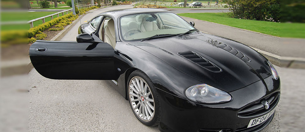 Jaguar body kit for a 2010 XKR Headlights bonnet vents clamshell bonnet and front bumper.